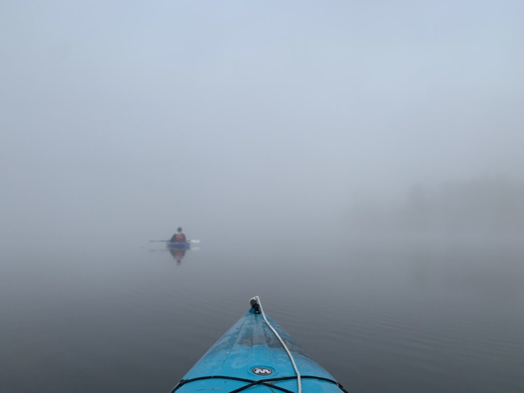 kayakers in the mist