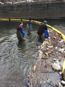 Youth work with Bronx River Alliance on a census of river trash.