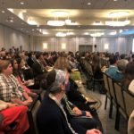 A full room during the welcome ceremony