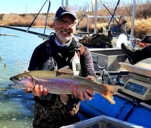 Ron Steg holding a fish.