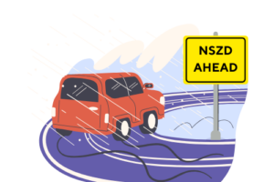 A red car driving on a curvy road with a sign that reads "NSZD Ahead."
